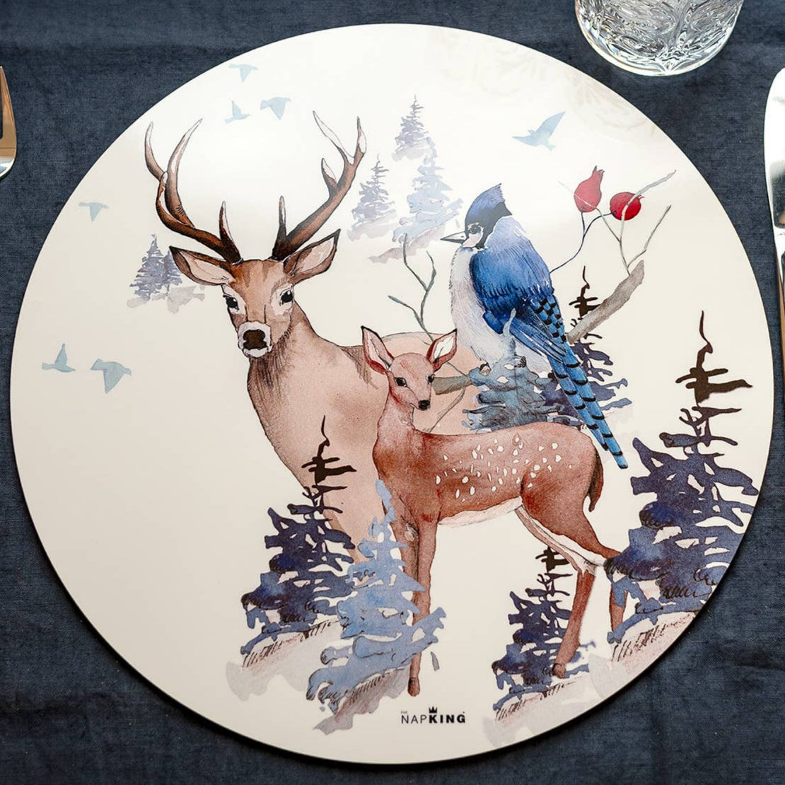 Buck round hardboard and cork placemats with woodland print