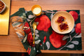 Grenade Green set of four Cotton Satin placemats with pomegranate and poinsettia print